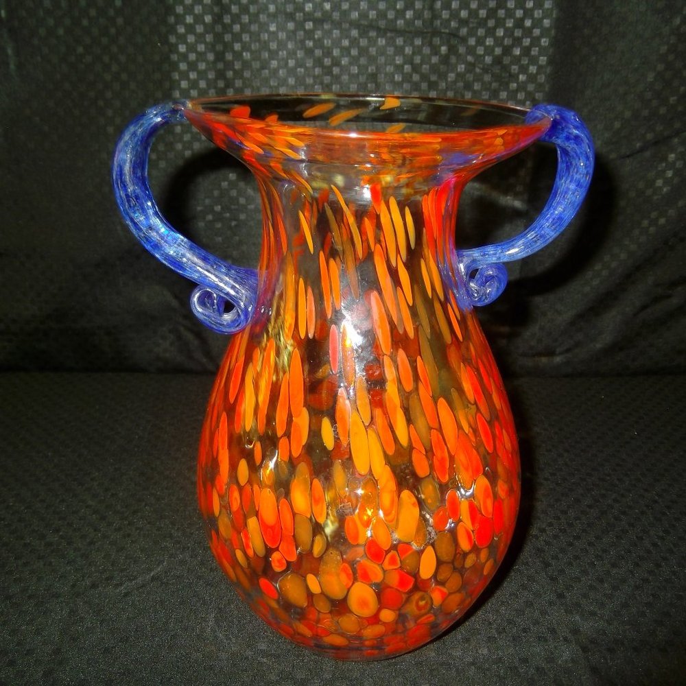 Orange /clear with blue handle vase